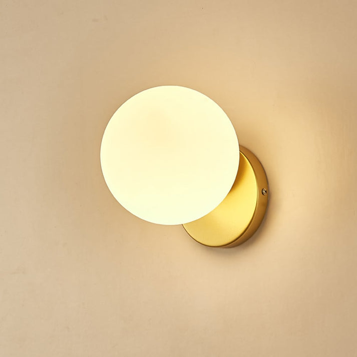 Stylish Single Globe Wall Light - Black or Brass Finish - Perfect for Bedrooms, Bathrooms, and Living Rooms