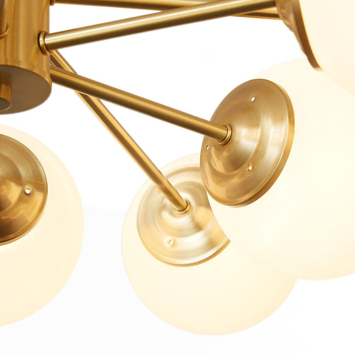 Sputnik Elegance: 12-Light Glass Globe Chandelier with Brass Finish - Modern Chic for Every Room!