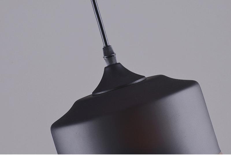 Sleek and Stylish: Minimalist Streamlined Silhouette Glass Pendant Lamp with Multi-Tone Design